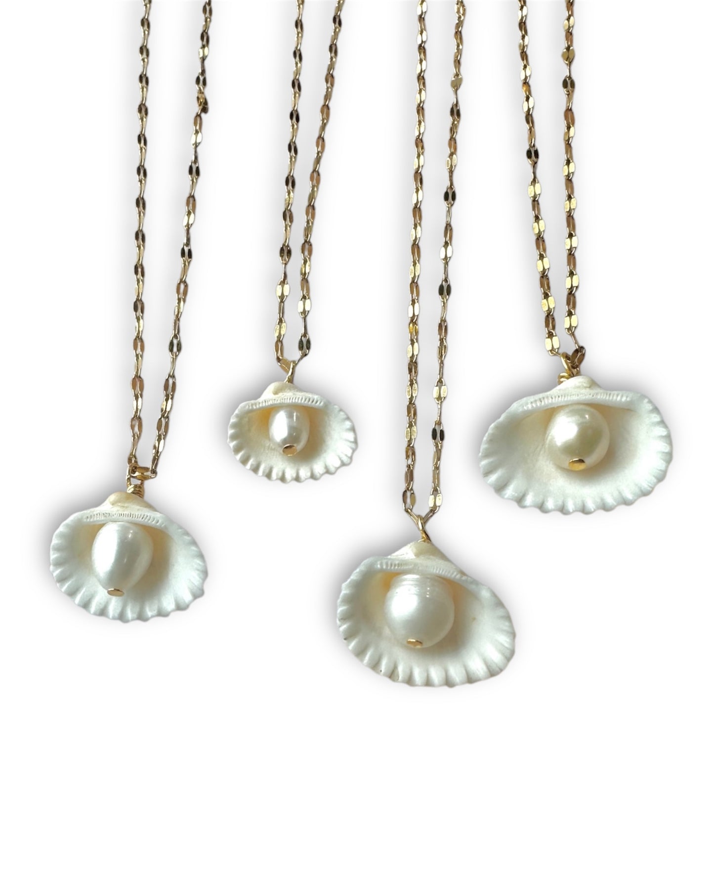Seaside Serenity Shell Necklace Available in silver and gold